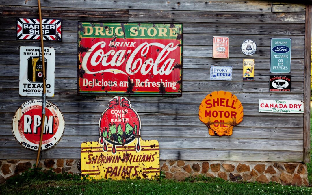 old metal signs on a weathered wall