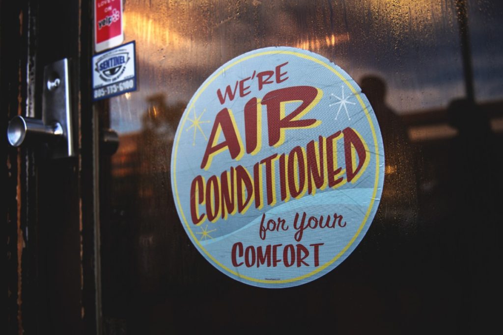 restaurant sign promoting air conditioned interior